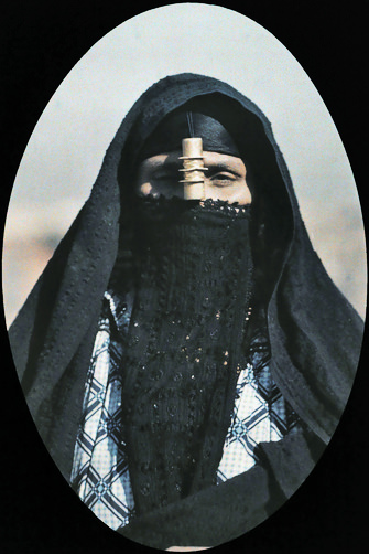 Woman wearing a Muslim headdress.