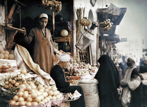 Egyptian street merchant sells fruits.