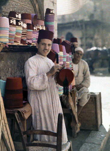 Two men work at a tarboosh booth in Cairo.