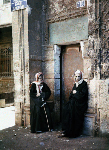 Two students of Mecca stand at the Mosque of el Azhar.