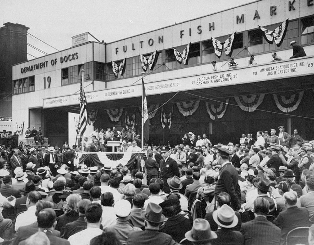 Mayor Fiorello LaGuardia speaking at the opening of the Fulton Fish Market, at Bleecker and South Sts, 1940s