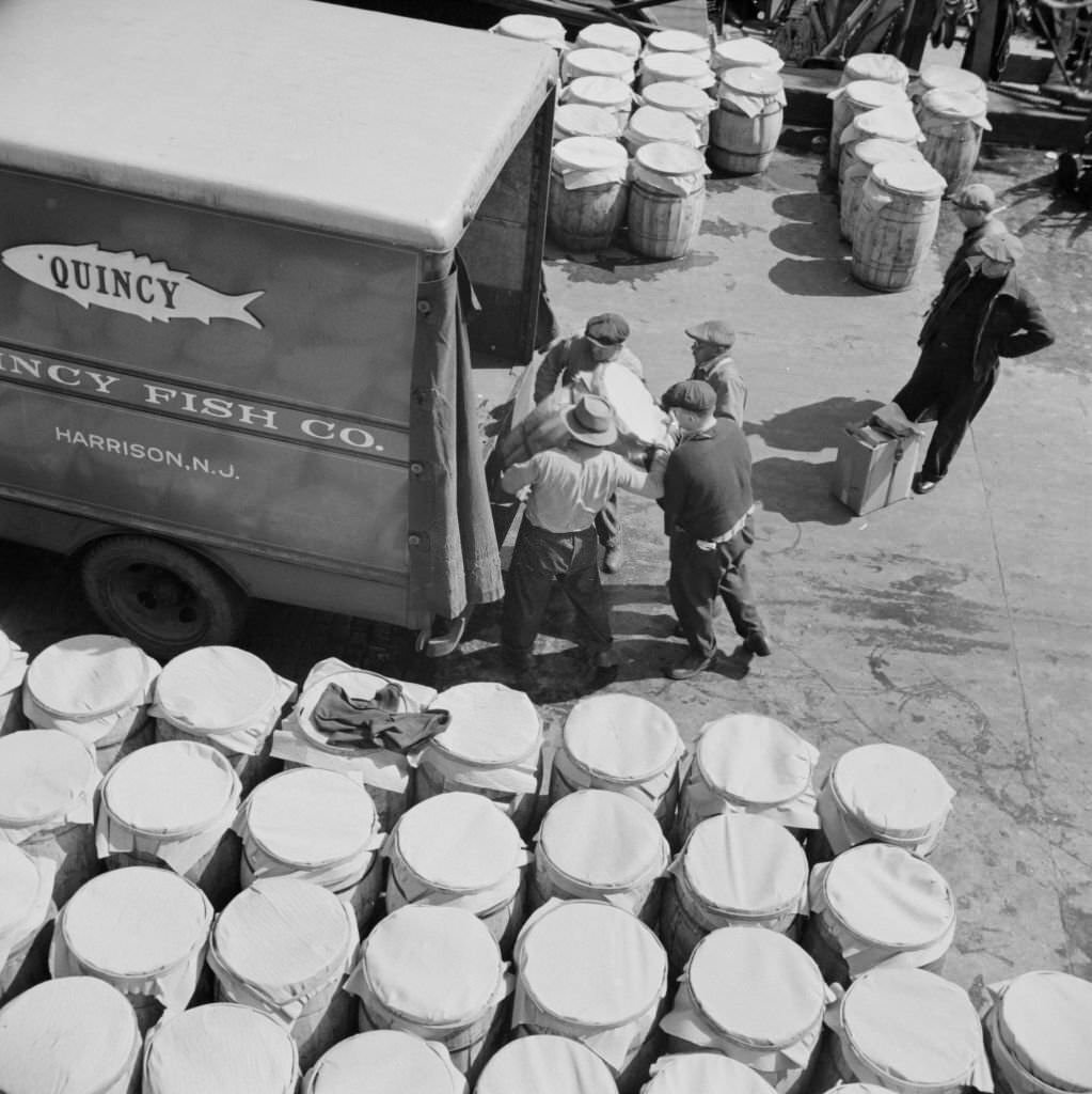 Barrels of fish on the docks at Fulton fish market ready to be shipped to retailers.