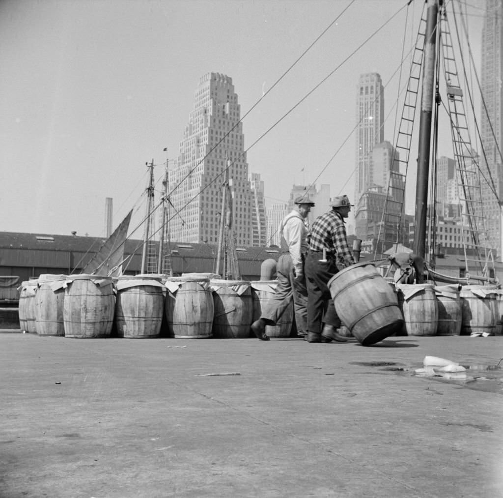 Barrels of fish on the docks at Fulton fish market ready to be shipped to retailers.