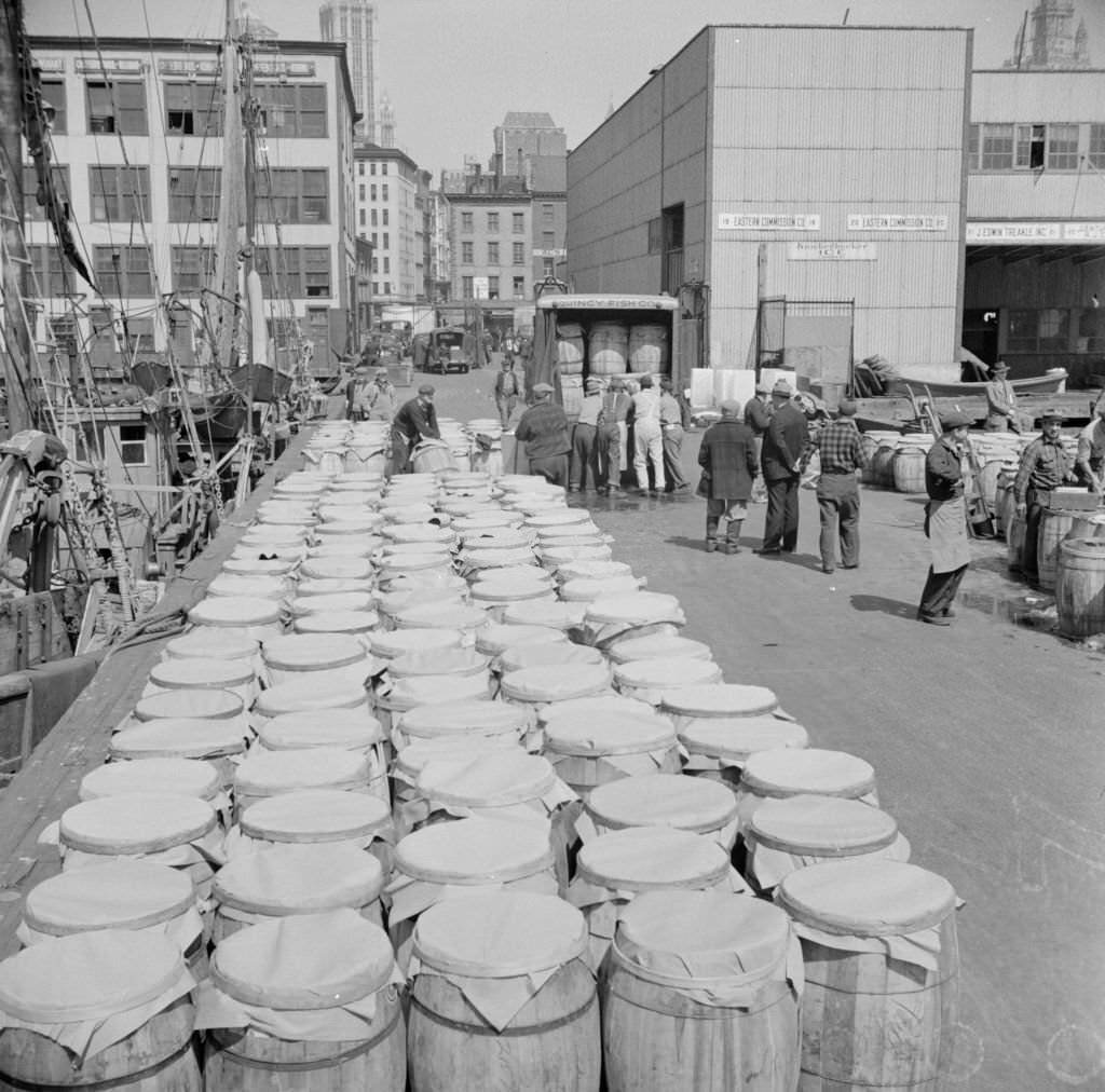 Barrels of fish on the docks at Fulton fish market ready to be shipped to retailers.