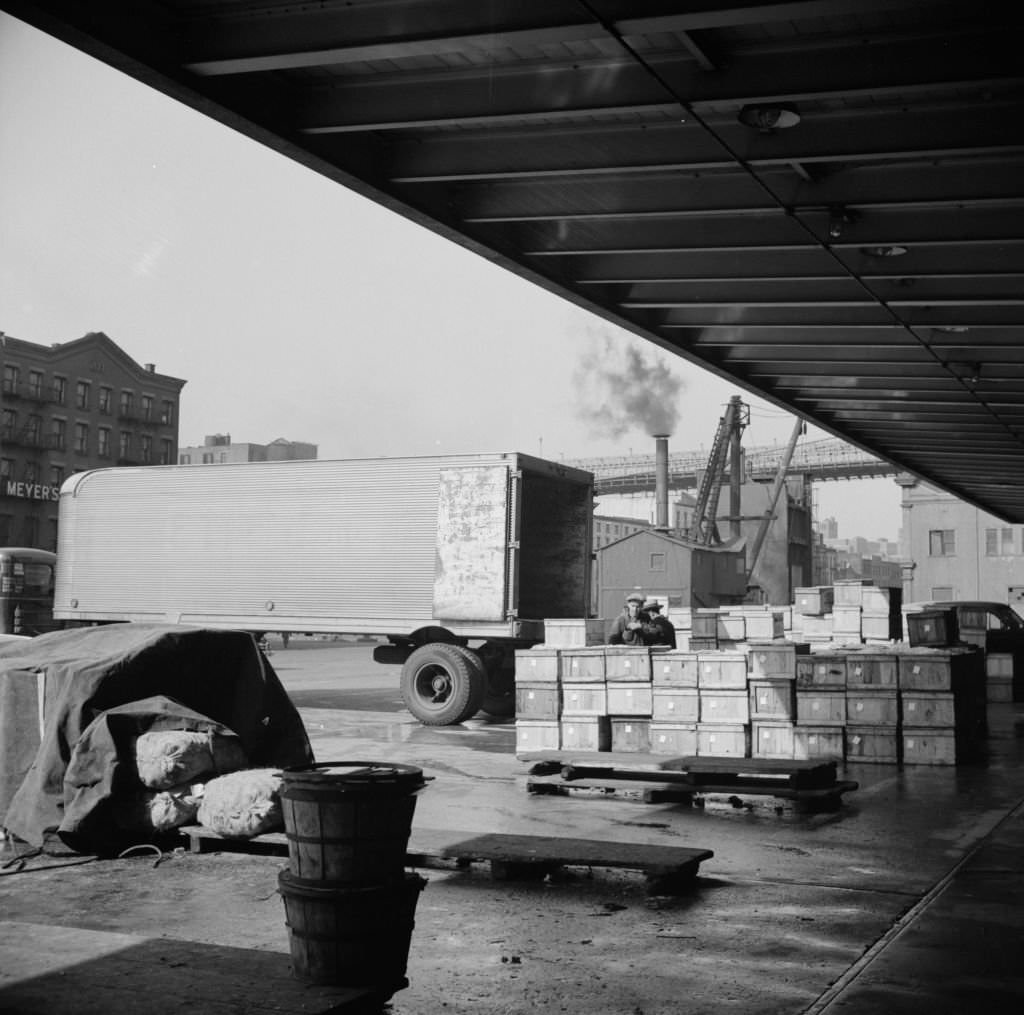 Crates of seafood waiting for delivery at the Fulton fish market, 1930s