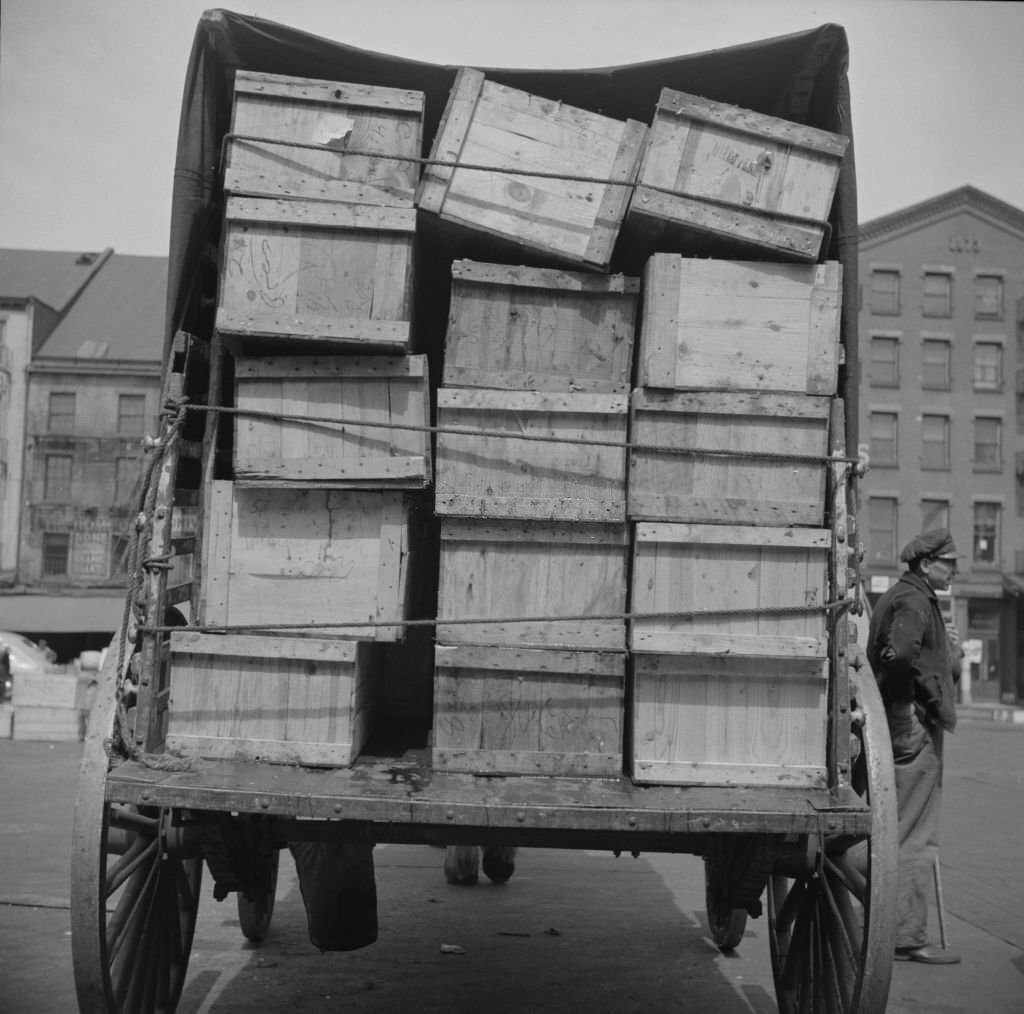 Shipping fish by horse-drawn vehicle from Fulton fish market, 1937