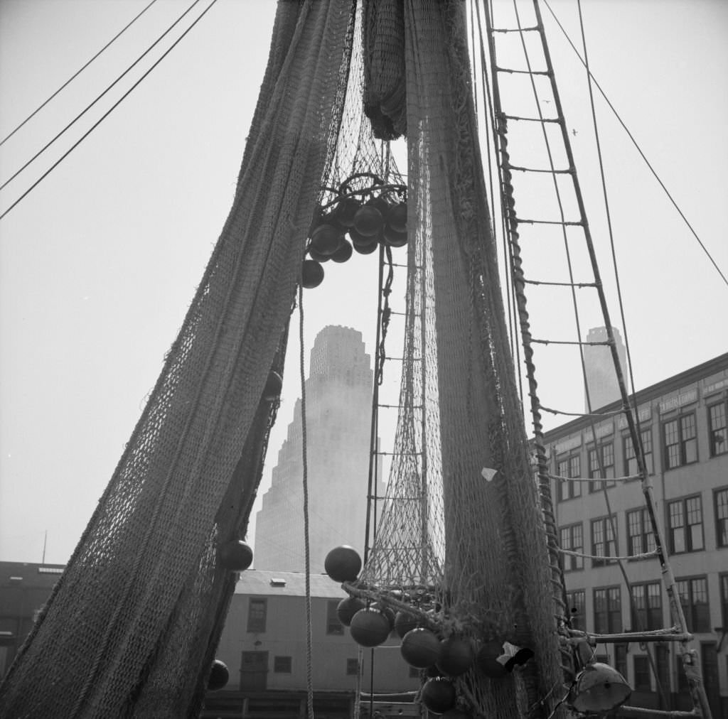 An early morning scene at the Fulton fish market, 1930s