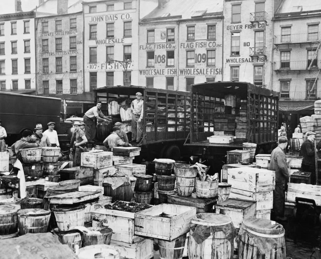 Fish and other seafood is loaded into trucks at the Fulton Fish Market for delivery to retail stores throughtout the city, 1946