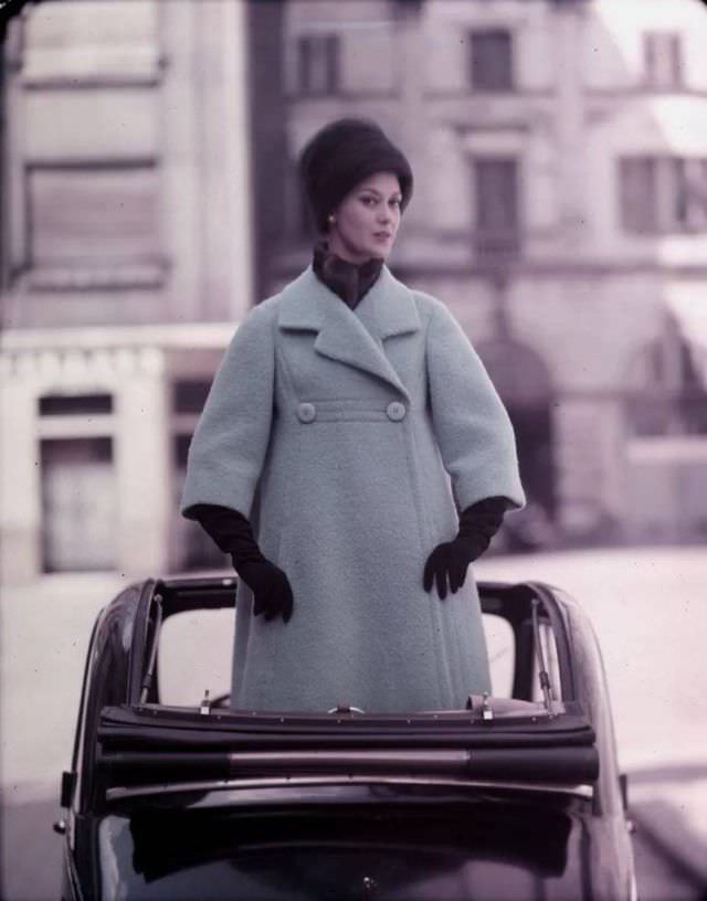 Jenny wearing a pale blue coat, 1957