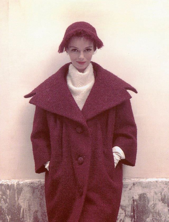 Sandy Brown in winter coat with large collar and matching cloche, 1957