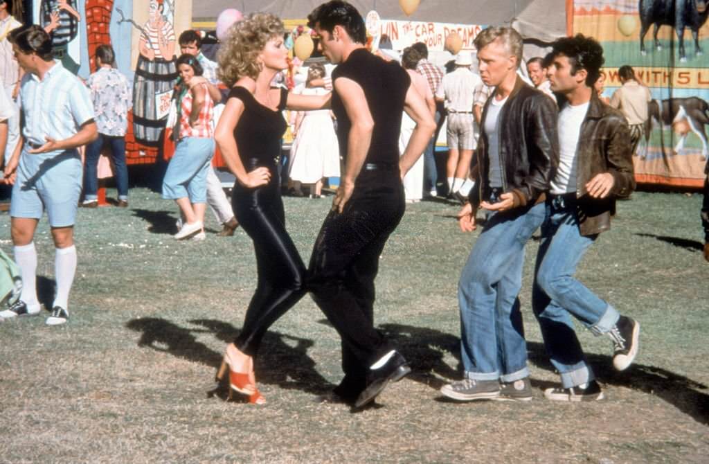 Olivia Newton-John and John Travolta on the set of Grease, directed by Randal Kleiser, 1978.