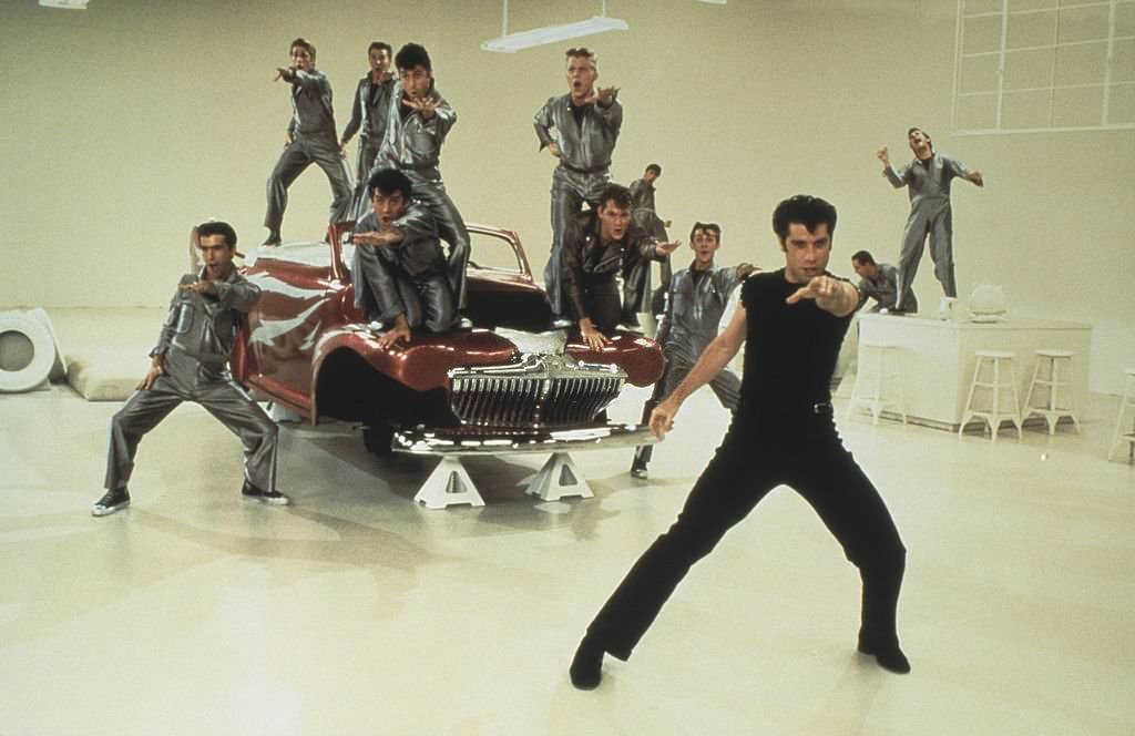 John Travolta during the 'Greased Lightning' scene from the film, 'Grease', 1978.