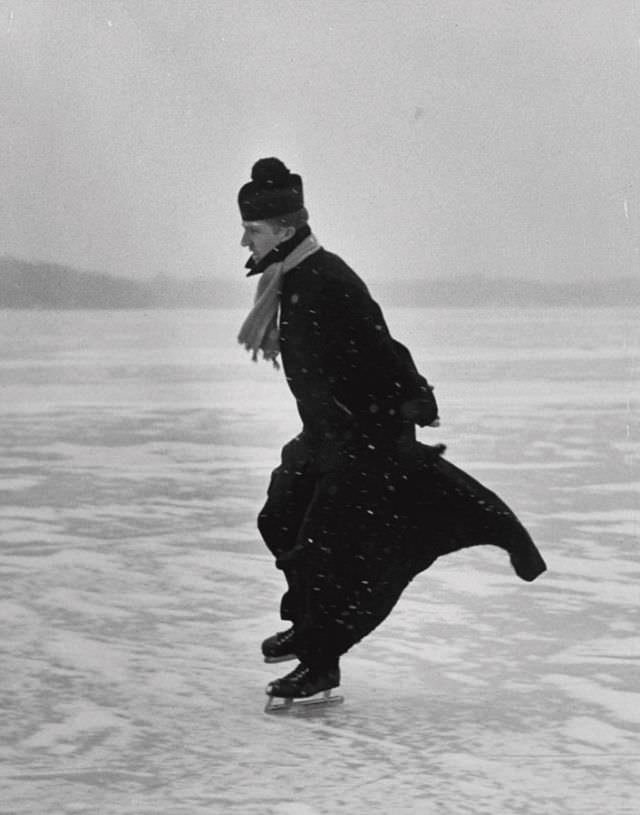 Priest ice skating, 1955. (John Dominis)