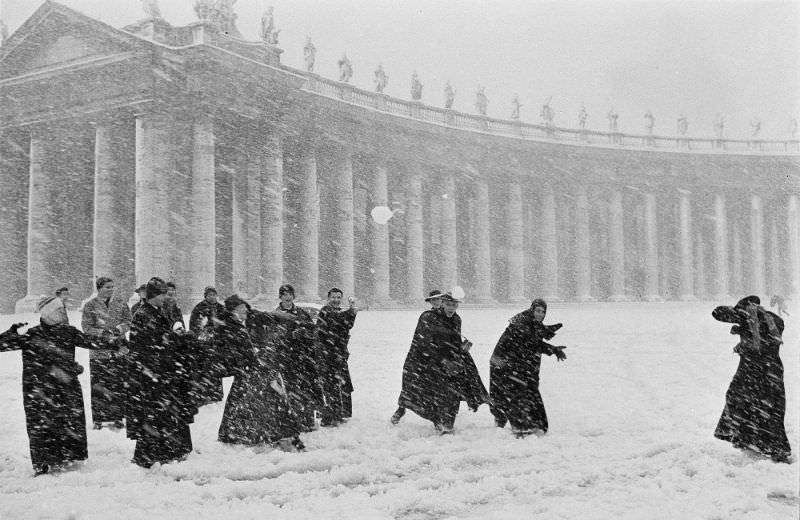Student priests hurl snowballs in St. Peter's Square in Vatican City, February 1965.