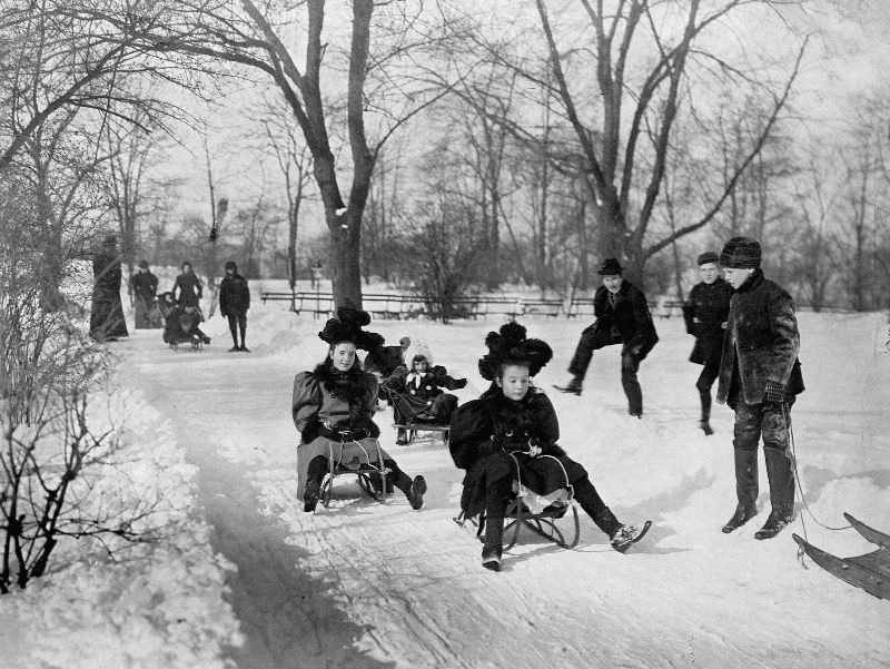Children sledding, 1900.
