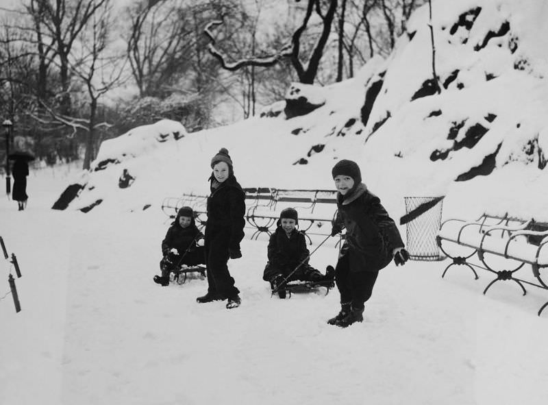 Children sledding, 1900.