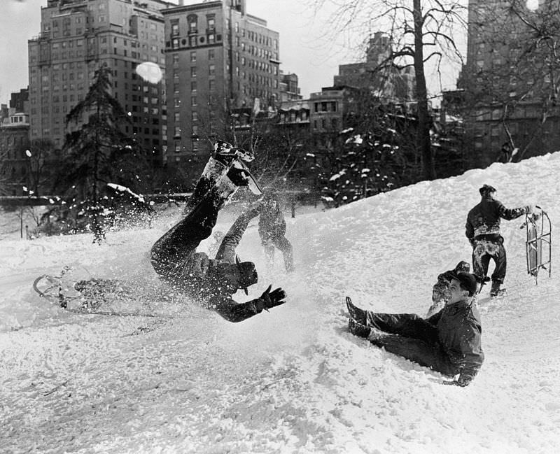 People sledding, 1947.