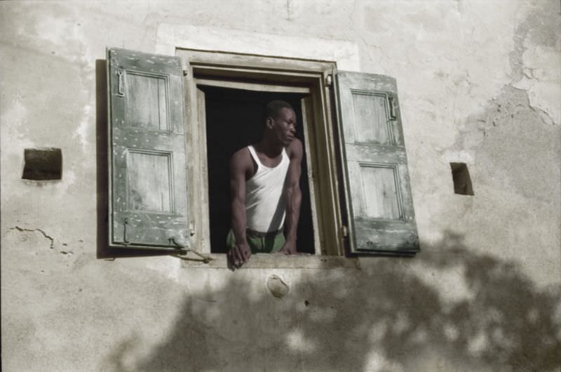 Worker who lives on one of the steep streets in Charlotte Amalie, St. Thomas, Virgin Islands, December 1941