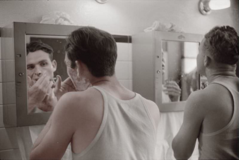 Truck drivers shaving at truck service station on U.S. 1 (New York Avenue), Washington, D.C., June 1940