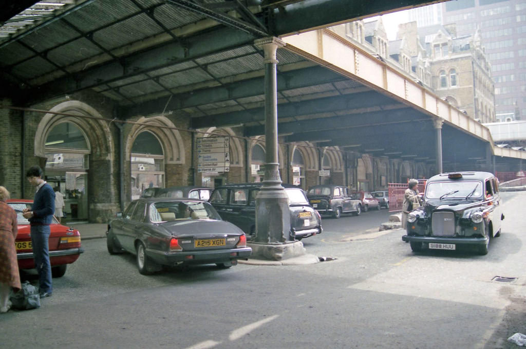 Liverpool St Station taxi ramp, 1987. MacDonald's are in the replica of the building that you can see in the right hand corner of this Photo