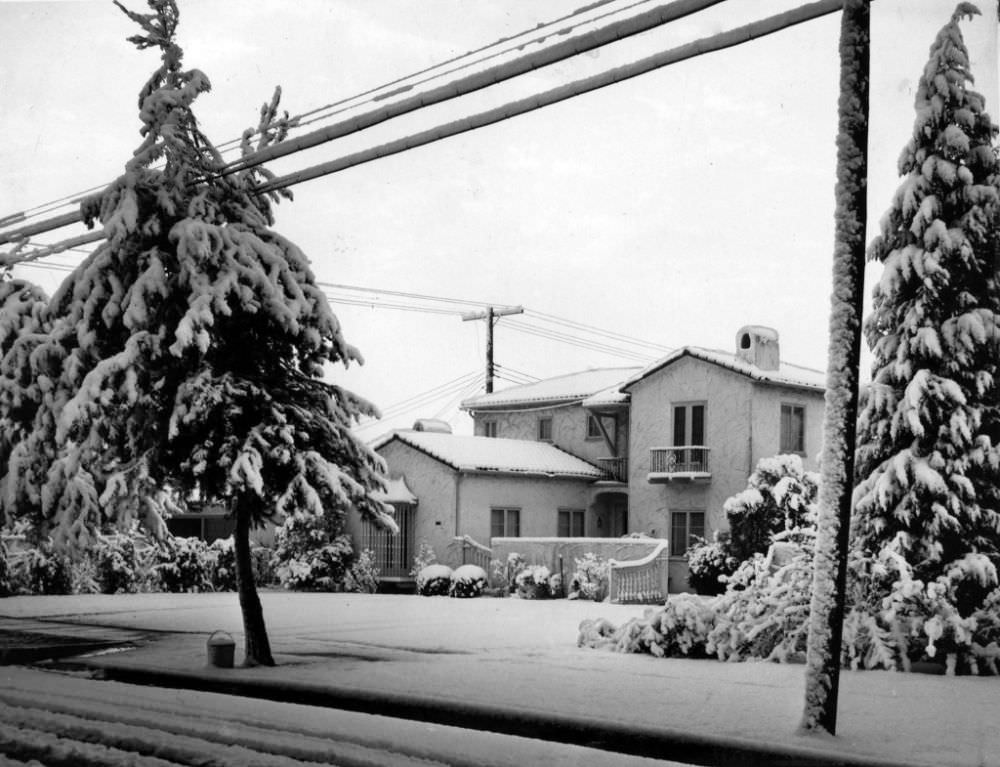 Snow covered a home on Opechee Way in the Verdugo Woodlands area of North Glendale.