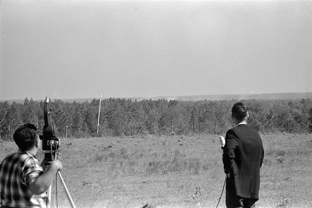 News media observe the Project Salmon detonation from 3.5 miles southwest of ground zero.