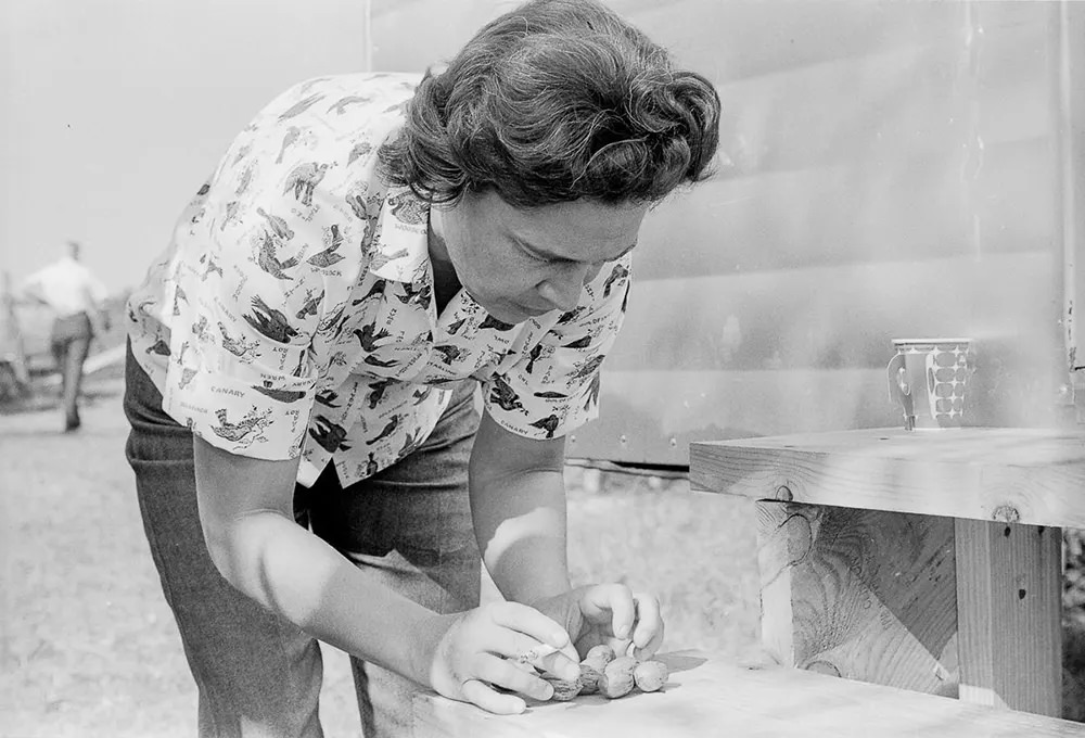 A resident constructs a homemade seismograph before the blast.