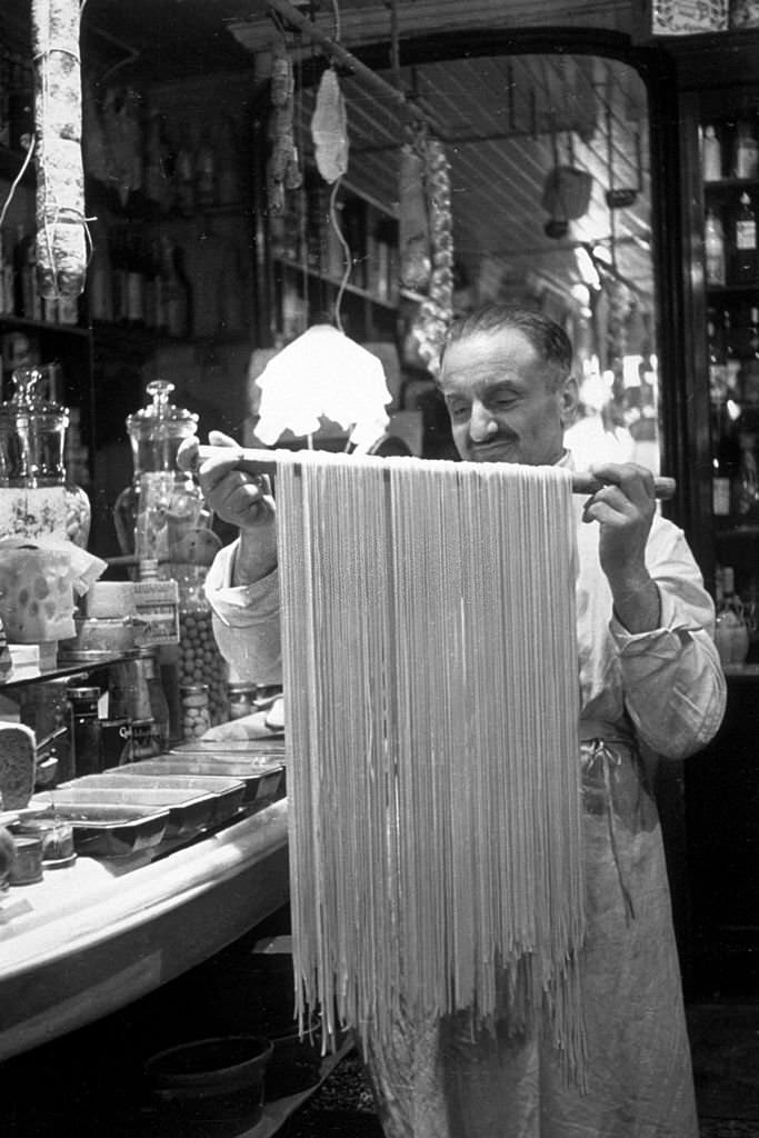 Eugenio Celoria making tagliatelli in his shop, King Bomba's, in Soho, 1939