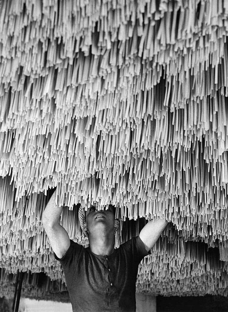 Spaghetti production Drying and hanging up spaghetti in Italy, 1932