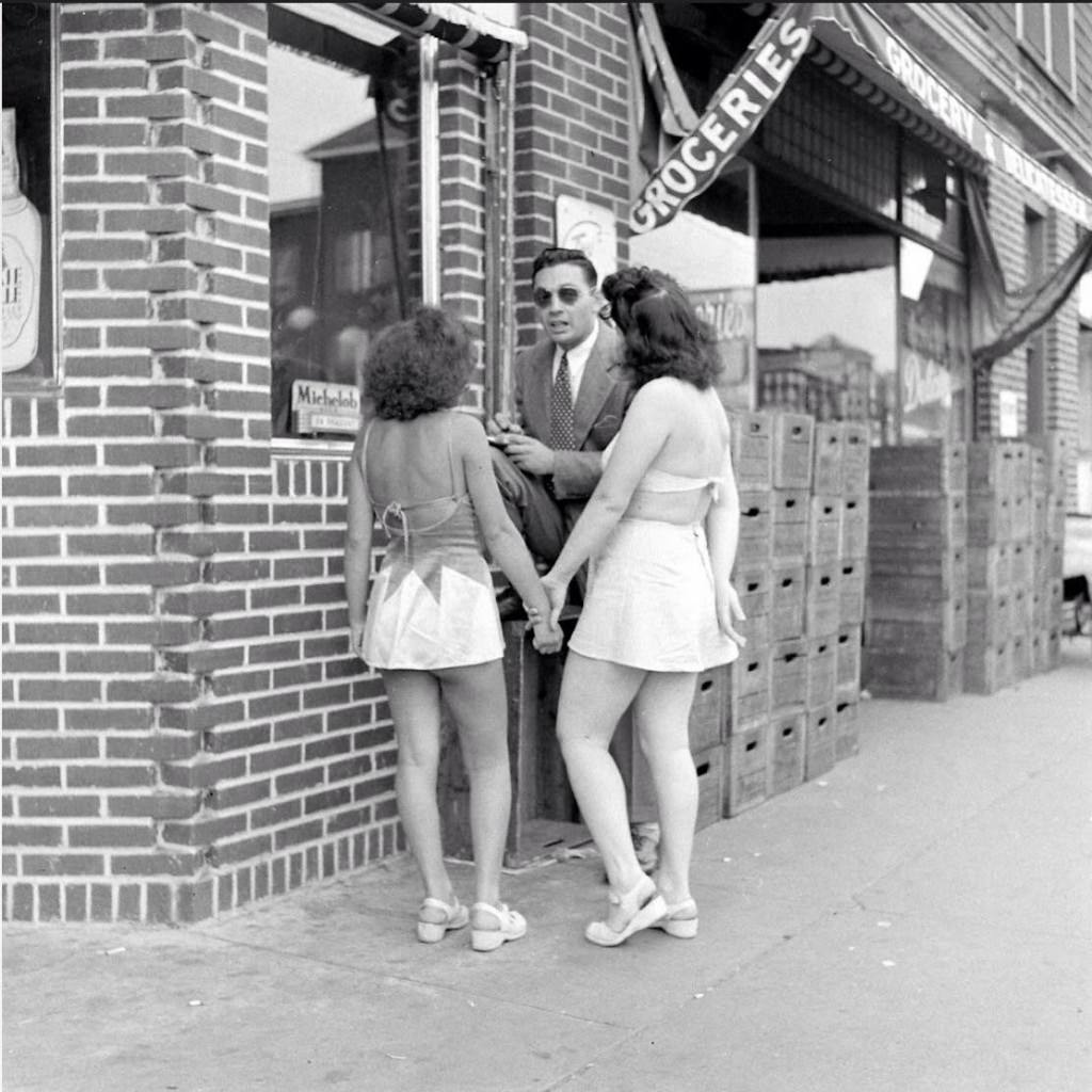 People being ticketed for 'Indecent Exposure' at Rockaway Beach of New York City, 1946