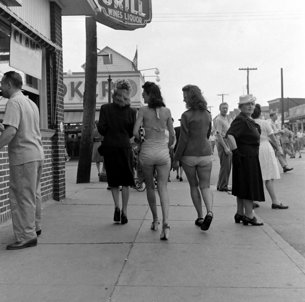 People being ticketed for 'Indecent Exposure' at Rockaway Beach of New York City, 1946