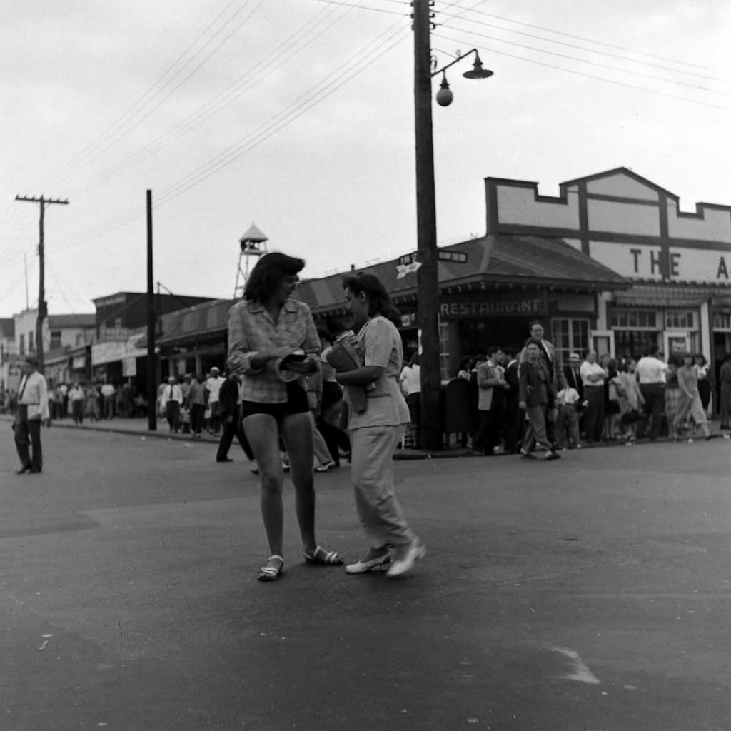 People being ticketed for 'Indecent Exposure' at Rockaway Beach of New York City, 1946