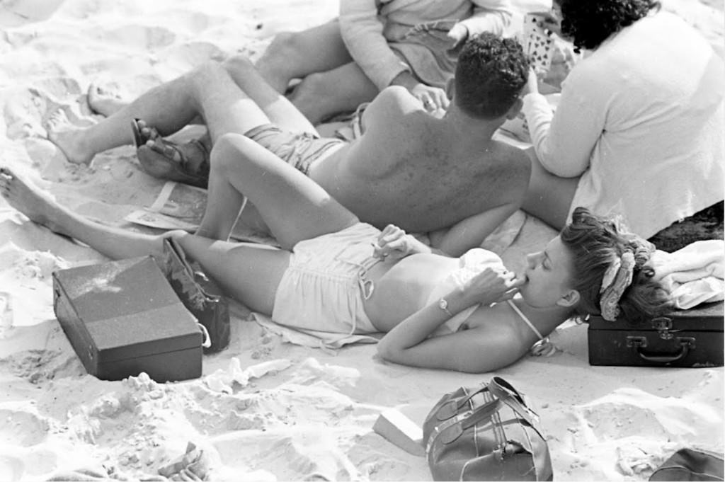 People being ticketed for 'Indecent Exposure' at Rockaway Beach of New York City, 1946