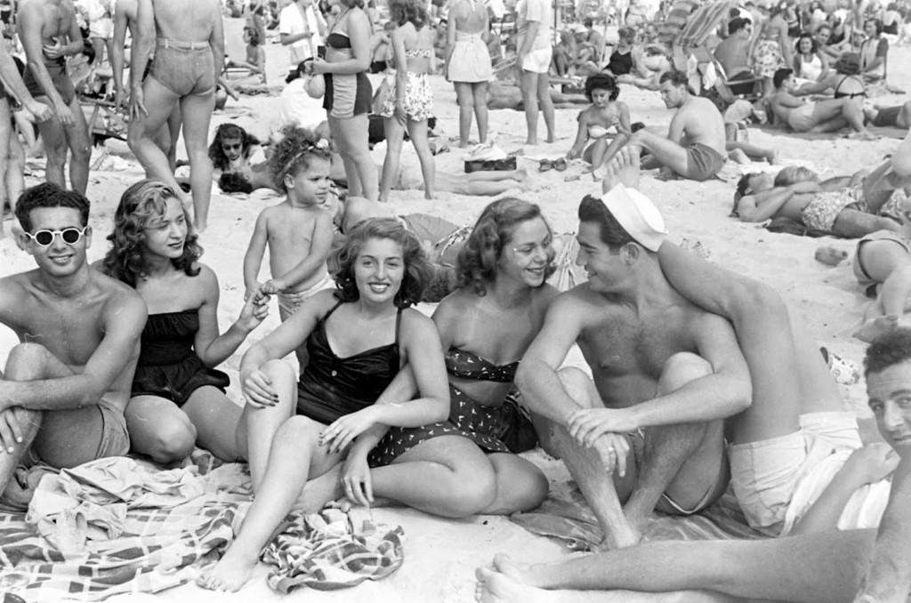 People being ticketed for 'Indecent Exposure' at Rockaway Beach of New York City, 1946