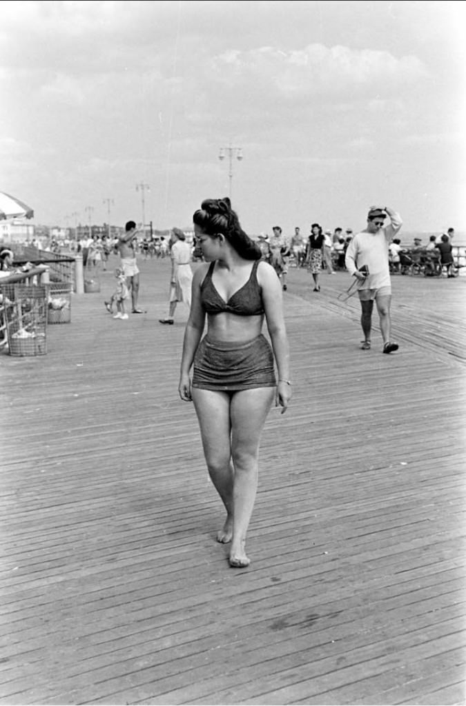 People being ticketed for 'Indecent Exposure' at Rockaway Beach of New York City, 1946