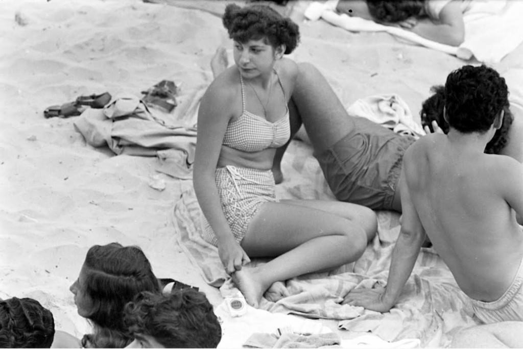 People being ticketed for 'Indecent Exposure' at Rockaway Beach of New York City, 1946