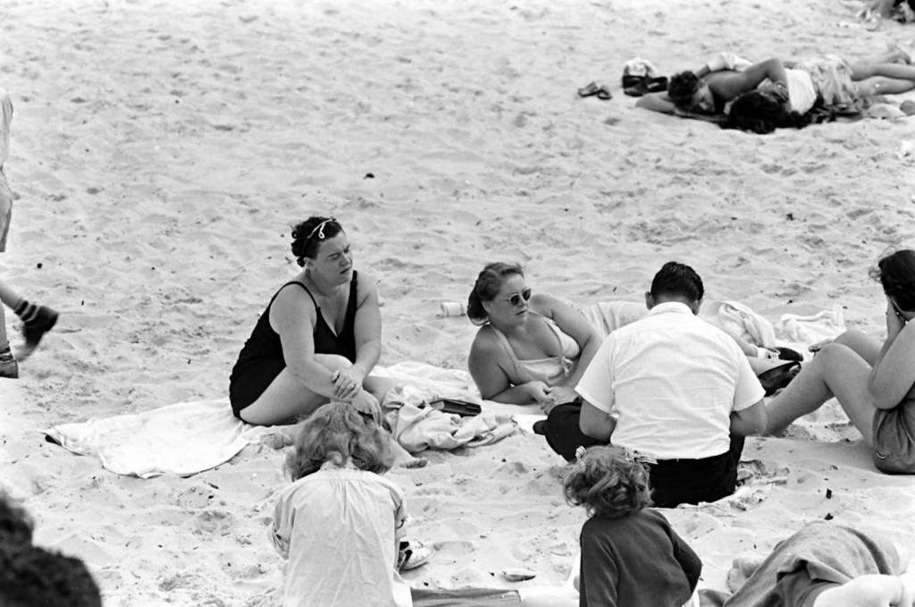 People being ticketed for 'Indecent Exposure' at Rockaway Beach of New York City, 1946