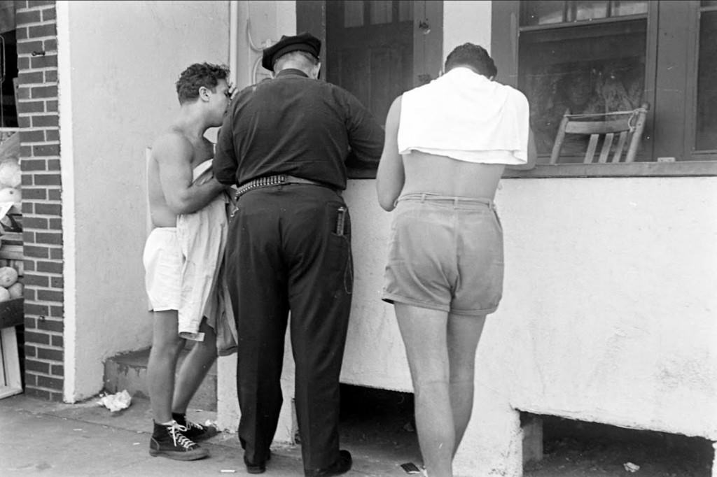 People being ticketed for 'Indecent Exposure' at Rockaway Beach of New York City, 1946