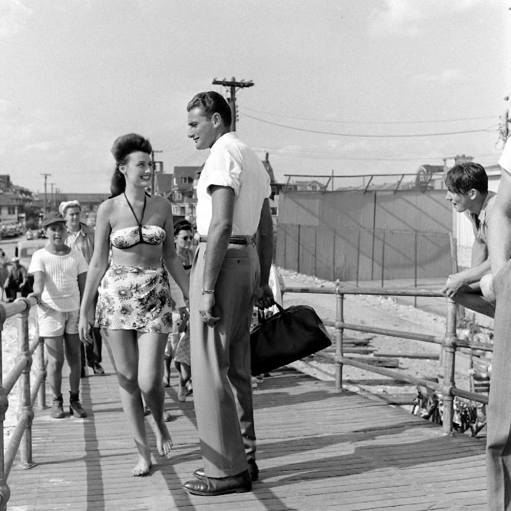 People being ticketed for 'Indecent Exposure' at Rockaway Beach of New York City, 1946