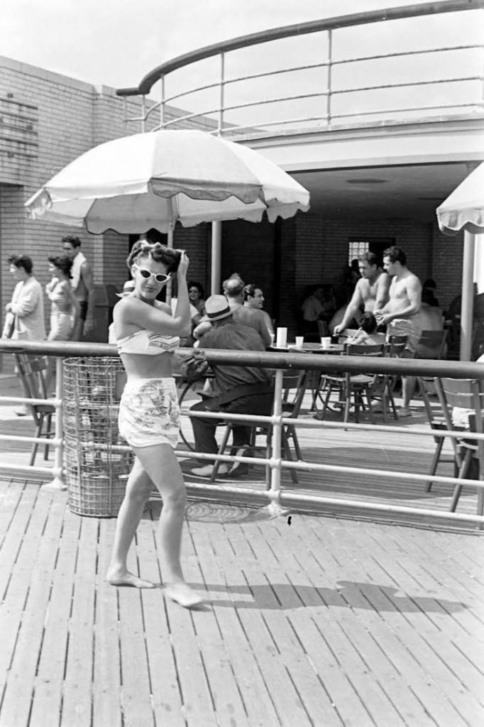 People being ticketed for 'Indecent Exposure' at Rockaway Beach of New York City, 1946