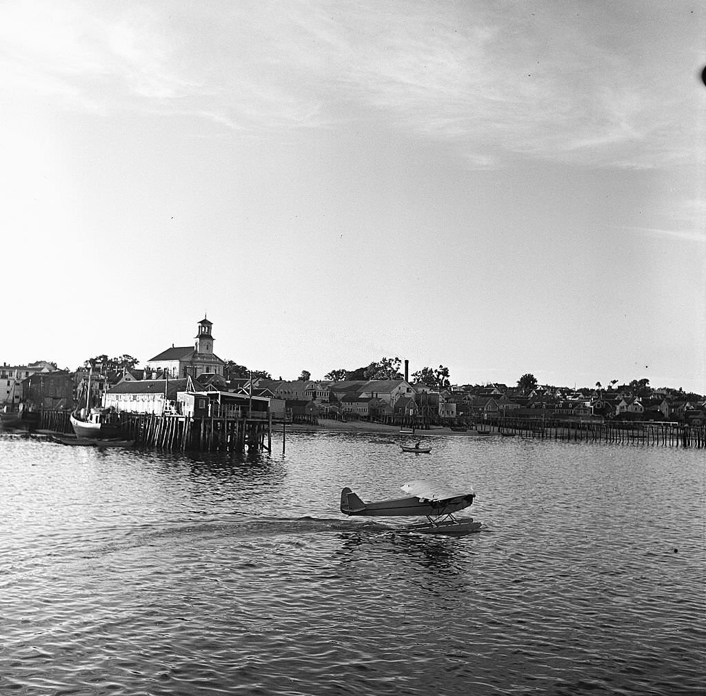 A seaplane lands on the water, Provincetown, Massachusetts, 1948.