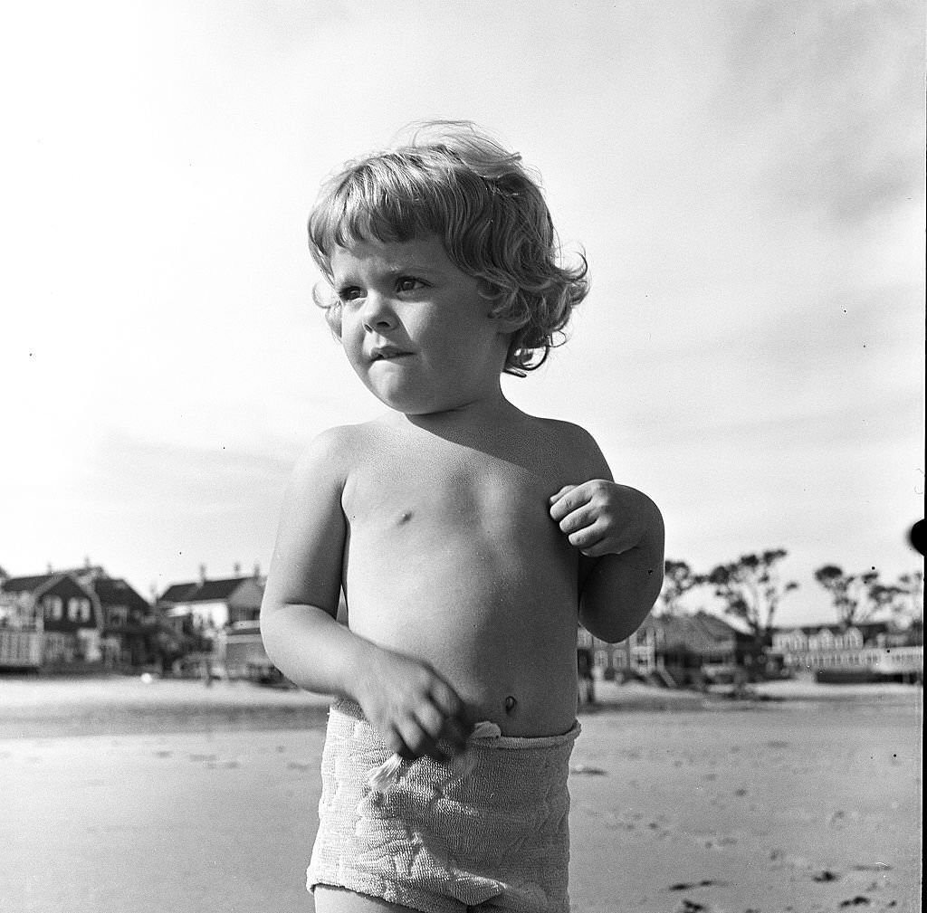A young child standing on a beach, Provincetown, Massachusetts, 1948.