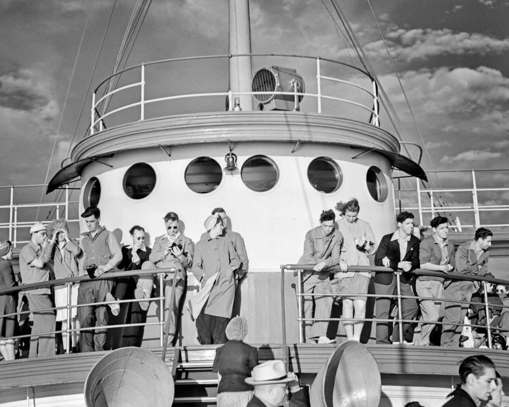 Group of Passengers Seasonal Visitors standing on deck of Steamer from Boston to Provincetown Massachetts, 1940s