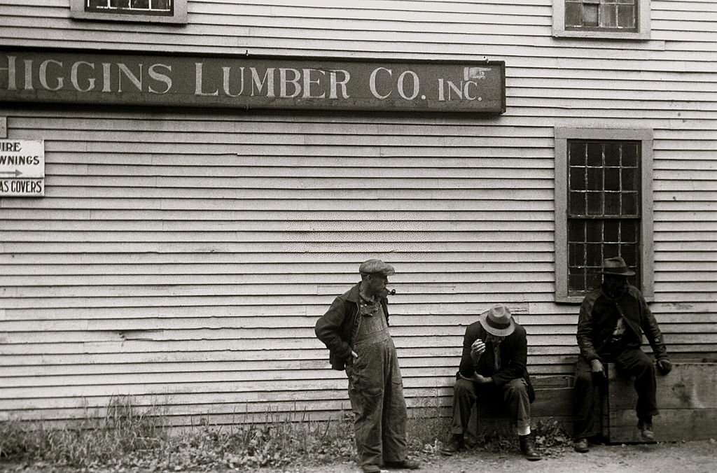 African American sit by the side of Lumberyard in Provincetown, 1940s