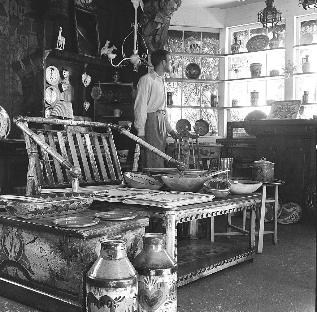 Visitors look at various items at an antique shop, Provincetown, Massachusetts, 1948.