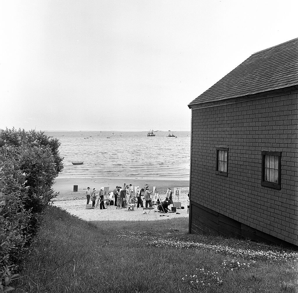 View of a painting class with their easels set up on the beach, Provincetown, Massachusetts, 1948.