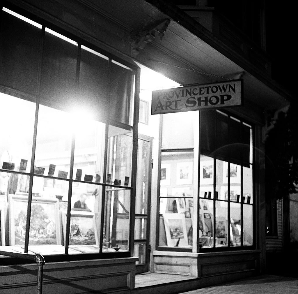 Night time view showing the window of the Provincetown Art Shop, Provincetown, Massachusetts, 1948.