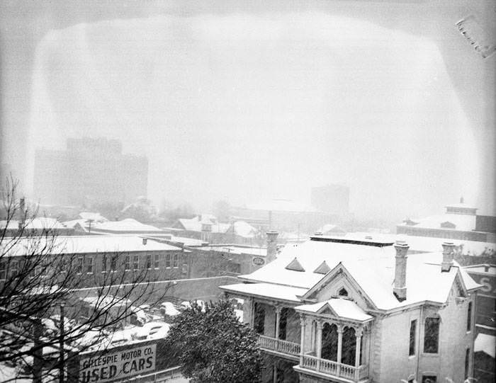 Snow on building rooftops, San Antonio, 1949