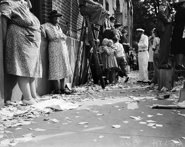 Crowds watching the 1940 Battle of Flowers Parade, 1940
