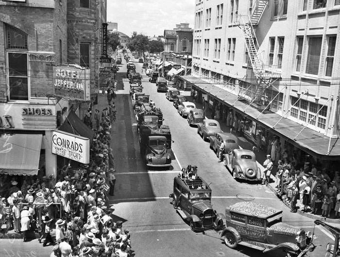 Parade of junk cars on Jefferson Street, 1943. Looking north on Jefferson Street, from Broadway, toward jalopy parade.